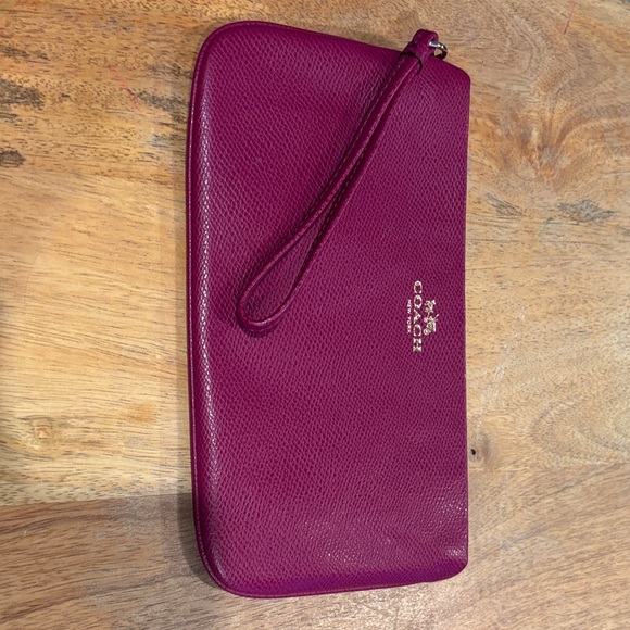 Coach Handbags - Coach Fuchsia Leather Wristlet